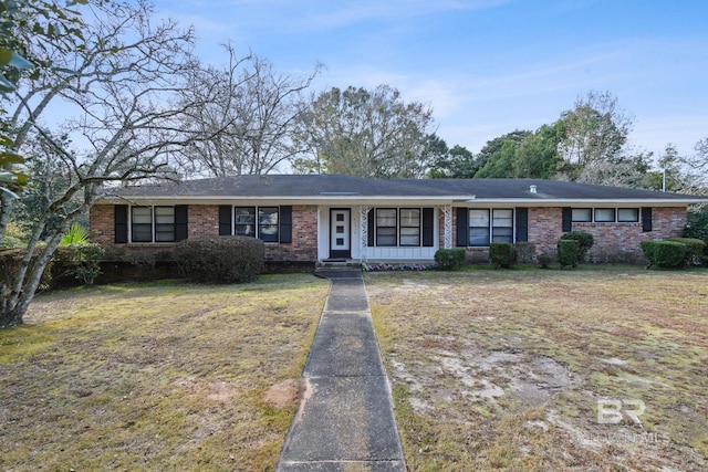 ranch-style house with a front yard