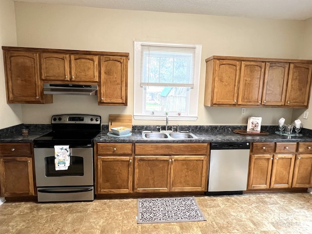 kitchen featuring stainless steel appliances and sink