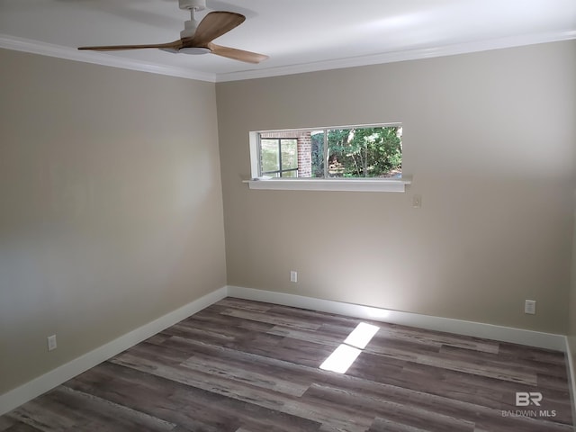 unfurnished room featuring crown molding, ceiling fan, and dark hardwood / wood-style flooring