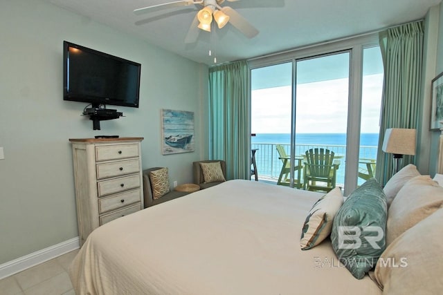 tiled bedroom featuring access to exterior, baseboards, and a ceiling fan