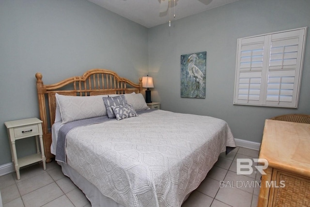 tiled bedroom with baseboards