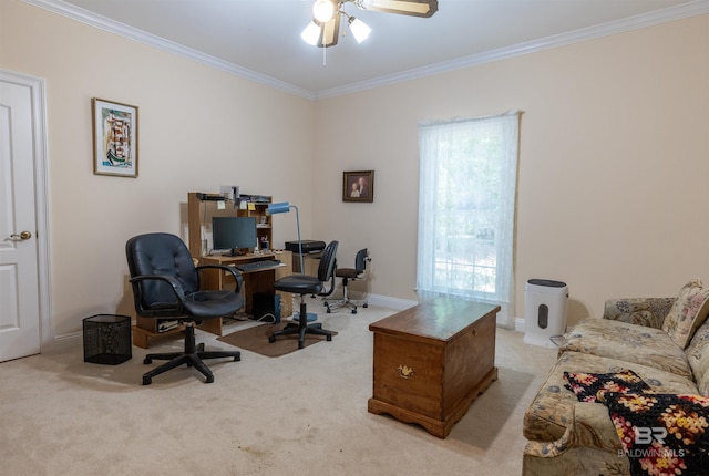 home office with baseboards, ornamental molding, ceiling fan, and light colored carpet
