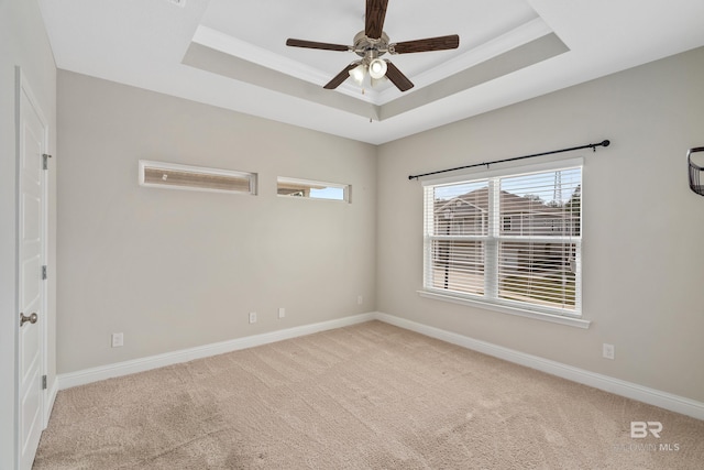 6877 Spaniel Dr Unit A, Spanish Fort, AL 36527 - carpeted empty room with baseboards, a ceiling fan, crown molding, and a raised ceiling
