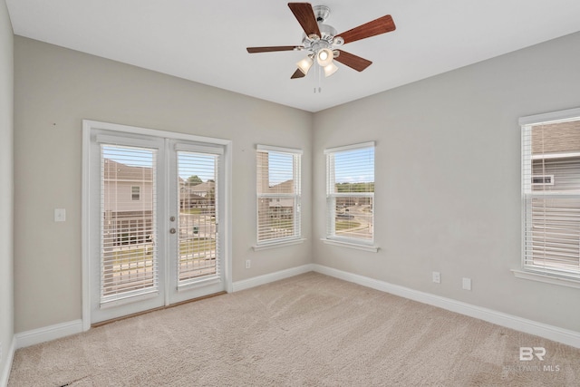 6877 Spaniel Dr Unit A, Spanish Fort, AL 36527 - carpeted empty room with a healthy amount of sunlight, a ceiling fan, and baseboards