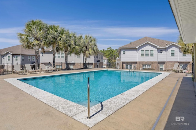 6877 Spaniel Dr Unit A, Spanish Fort, AL 36527 - pool with fence, a patio area, and a residential view