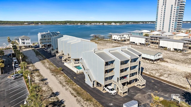 birds eye view of property featuring a water view