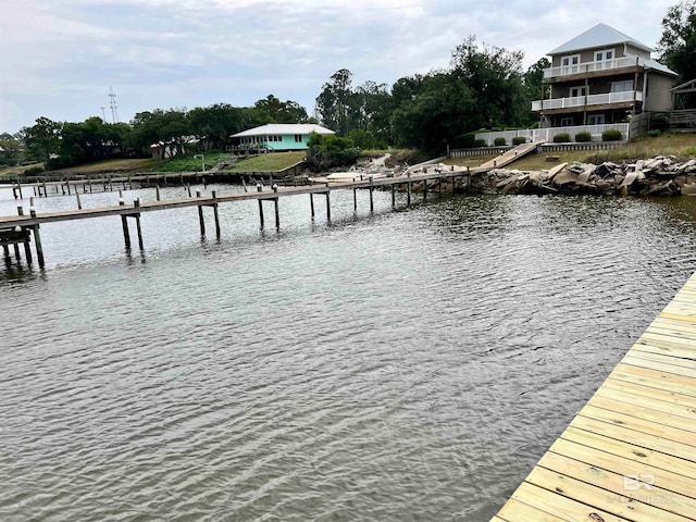 view of dock with a water view