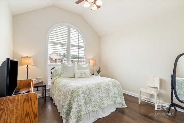 999 Weatherby St, Saraland, AL 36571 - bedroom featuring vaulted ceiling, dark wood-style flooring, a ceiling fan, and baseboards