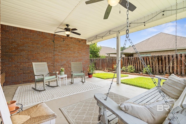 999 Weatherby St, Saraland, AL 36571 - fenced backyard with ceiling fan and a patio area