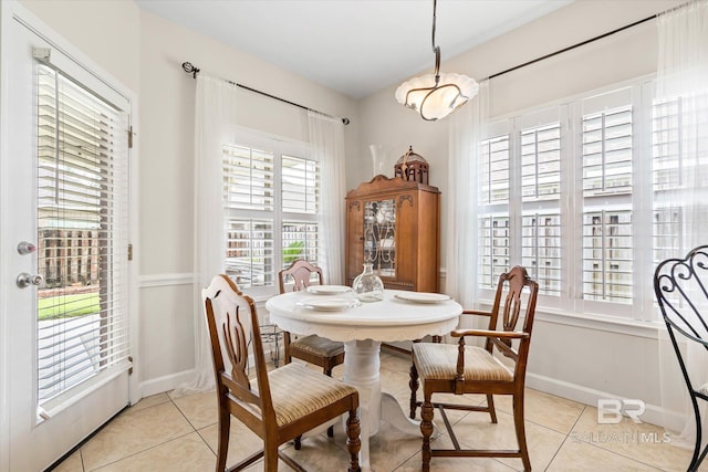 999 Weatherby St, Saraland, AL 36571 - dining room with light tile patterned floors and baseboards
