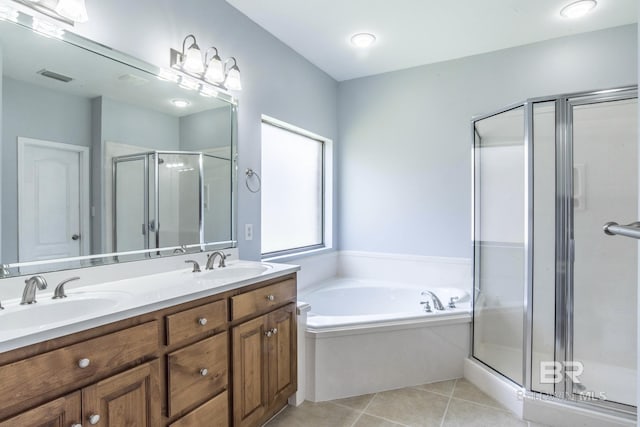 4005 Serene Ct, Foley, AL 36535 - full bathroom featuring tile patterned flooring, a stall shower, visible vents, and a sink