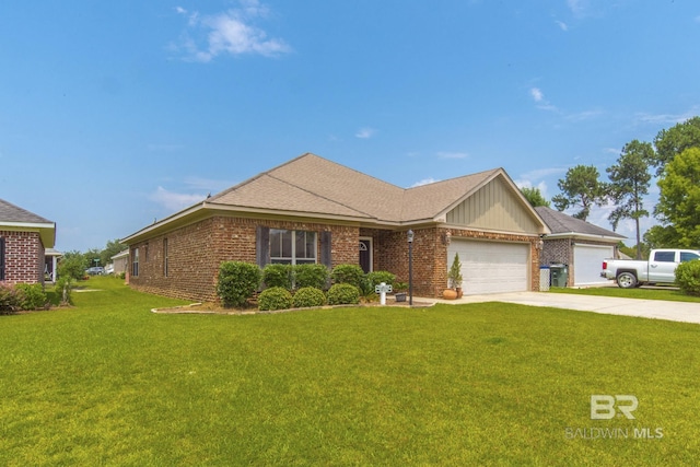 4005 Serene Ct, Foley, AL 36535 - single story home featuring a shingled roof, concrete driveway, an attached garage, a front yard, and brick siding