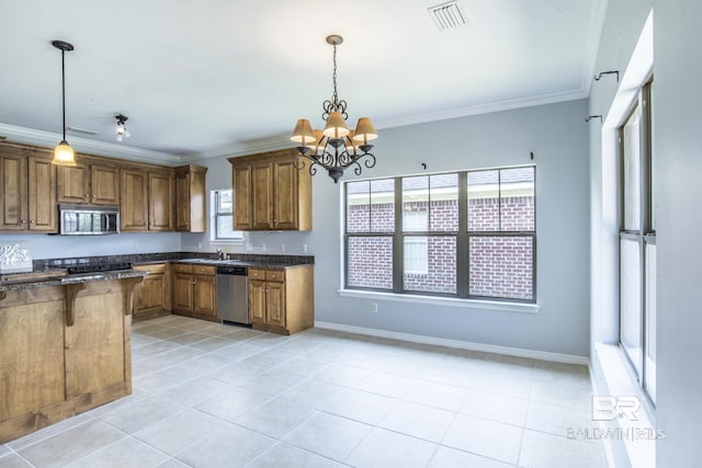 4005 Serene Ct, Foley, AL 36535 - kitchen featuring stainless steel appliances, visible vents, a chandelier, and brown cabinetry