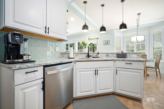 14 General Canby Dr, Spanish Fort, AL 36527 - kitchen with stainless steel dishwasher, a peninsula, light tile patterned flooring, white cabinetry, and ornamental molding