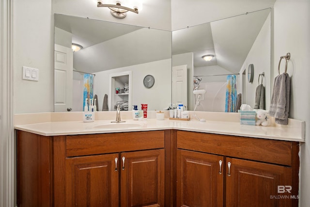 14 General Canby Dr, Spanish Fort, AL 36527 - full bathroom featuring vanity, lofted ceiling, and a shower with curtain