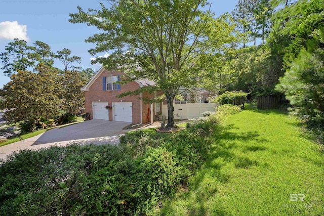 14 General Canby Dr, Spanish Fort, AL 36527 - view of front of home with an attached garage, driveway, and brick siding