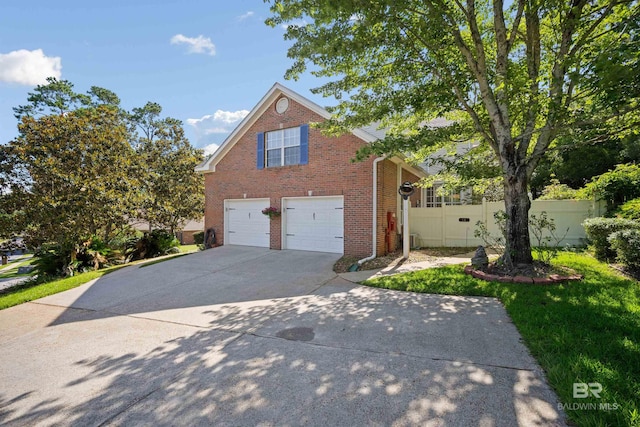 14 General Canby Dr, Spanish Fort, AL 36527 - view of front facade with a garage, brick siding, and concrete driveway