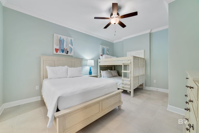 bedroom featuring baseboards, light tile patterned flooring, a ceiling fan, and crown molding