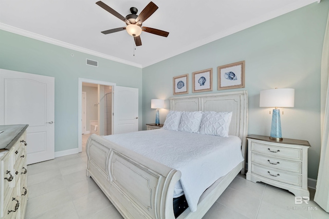 bedroom with baseboards, visible vents, a ceiling fan, ensuite bath, and crown molding