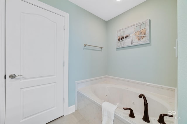 bathroom featuring a jetted tub