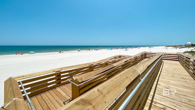 view of community featuring a water view and a view of the beach