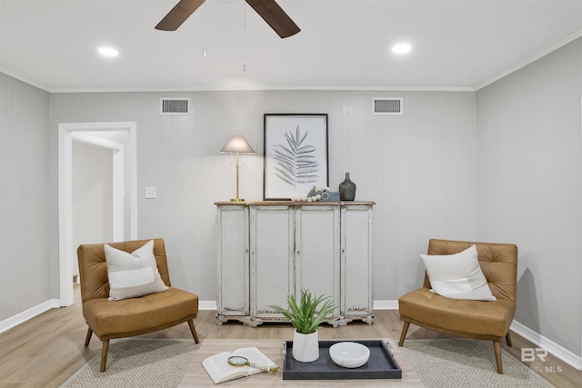 300 Indian Creek Dr, Mobile, AL 36607 - living area with wood finished floors, ornamental molding, recessed lighting, ceiling fan, and baseboards