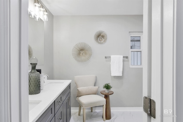 300 Indian Creek Dr, Mobile, AL 36607 - bathroom featuring marble look tiles, baseboards, and vanity