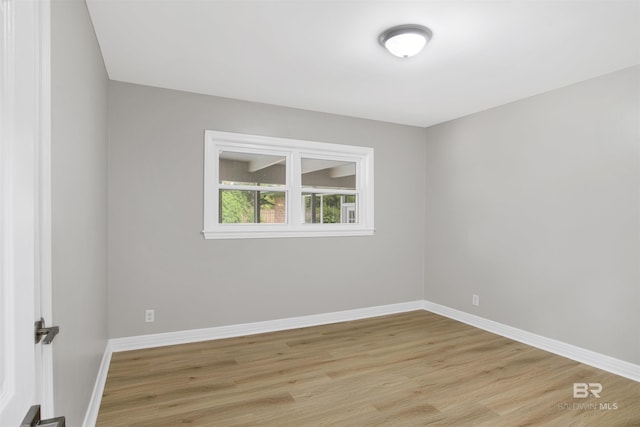 300 Indian Creek Dr, Mobile, AL 36607 - spare room featuring light wood-style floors and baseboards