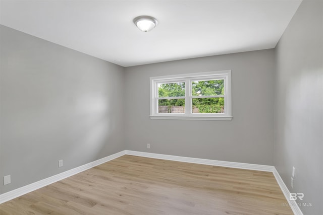 300 Indian Creek Dr, Mobile, AL 36607 - unfurnished room featuring baseboards and light wood-type flooring