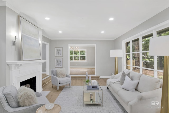 300 Indian Creek Dr, Mobile, AL 36607 - living area featuring wood finished floors, baseboards, ornamental molding, recessed lighting, and a fireplace with flush hearth