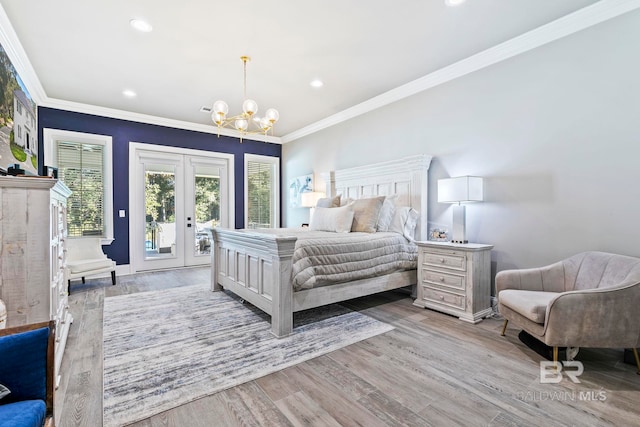 bedroom featuring french doors, a chandelier, ornamental molding, access to exterior, and light hardwood / wood-style floors