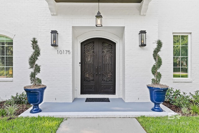 property entrance featuring french doors