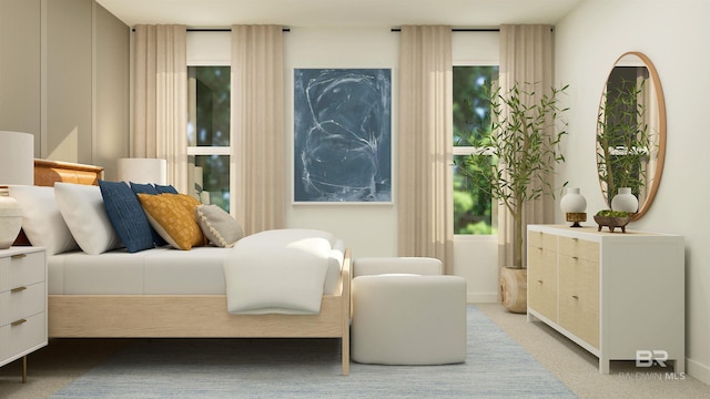 bedroom with light carpet