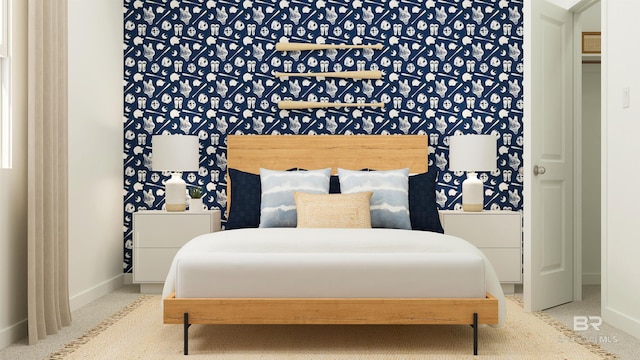 bedroom with baseboards and carpet floors