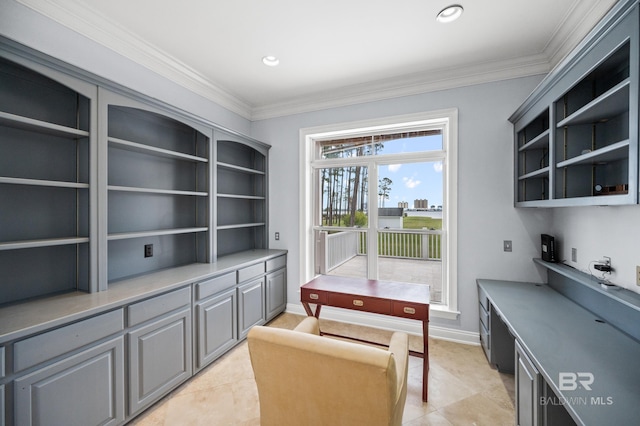 tiled home office featuring ornamental molding