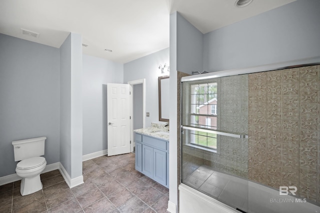 bathroom with tile patterned flooring, toilet, and vanity