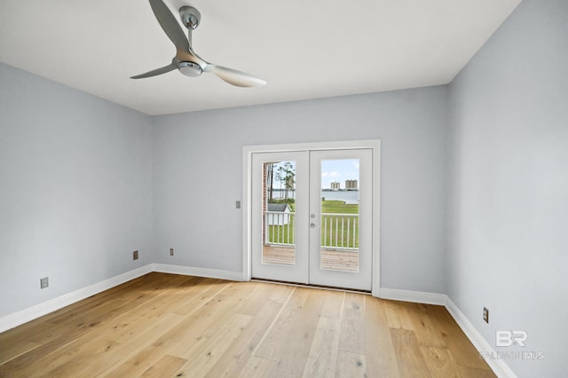 doorway to outside with ceiling fan, french doors, and light hardwood / wood-style flooring