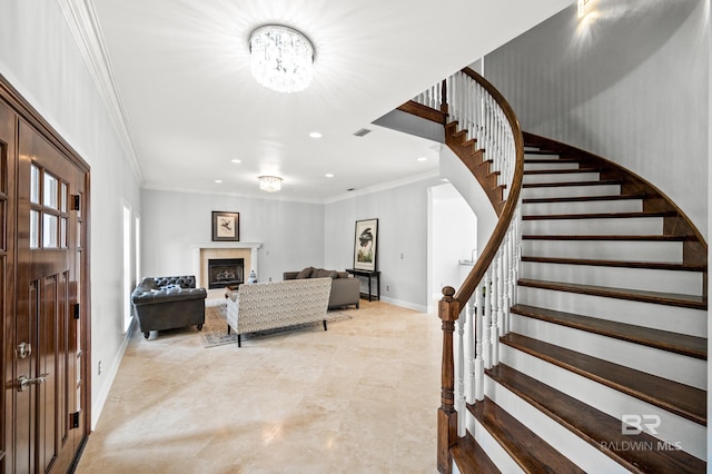 interior space with light tile patterned floors and ornamental molding