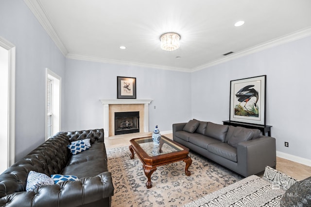 living room featuring a premium fireplace and ornamental molding