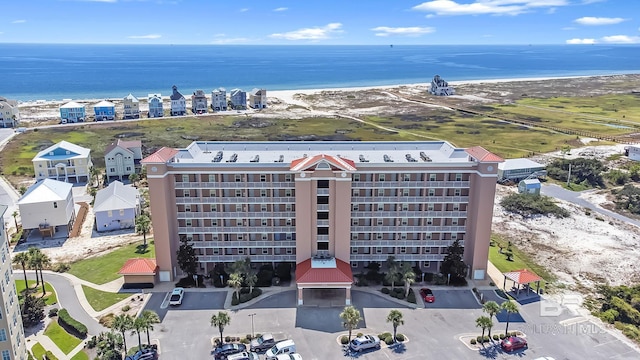 aerial view featuring a water view and a view of the beach