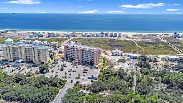 aerial view with a view of the beach and a water view