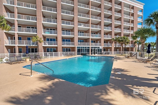 view of pool featuring a patio