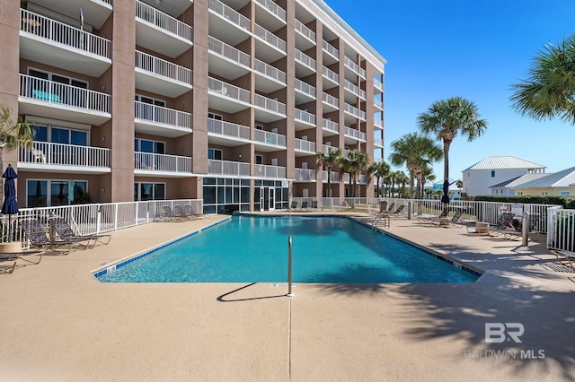 view of pool featuring a patio