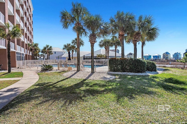 view of yard with a community pool