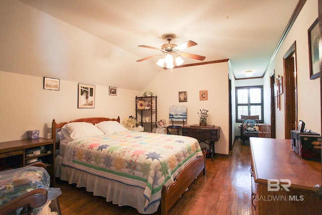 bedroom with ceiling fan, crown molding, dark hardwood / wood-style flooring, and vaulted ceiling