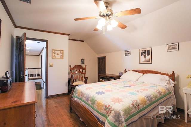 bedroom with ornamental molding, dark hardwood / wood-style flooring, ceiling fan, and vaulted ceiling