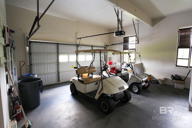 garage featuring a garage door opener