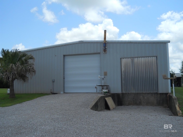 view of outbuilding with a garage