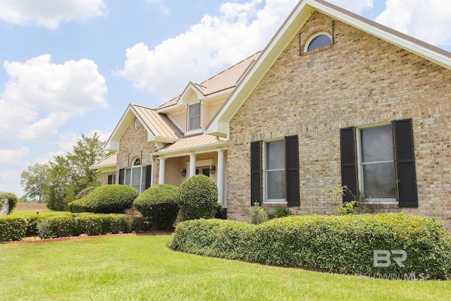 view of property with a front lawn