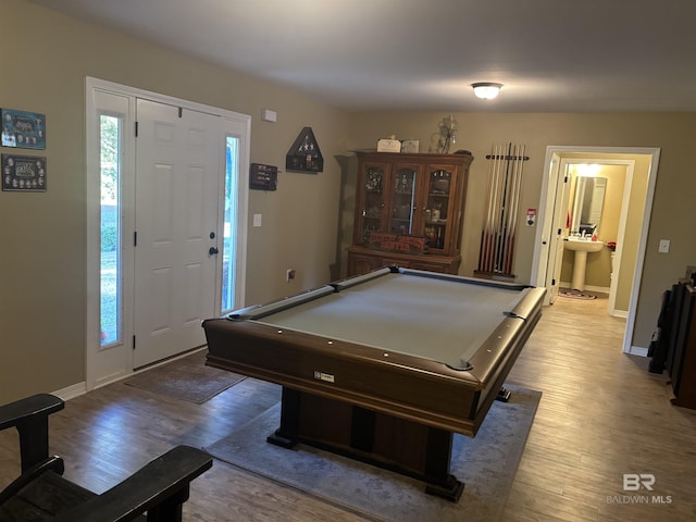 rec room with billiards and light wood-type flooring